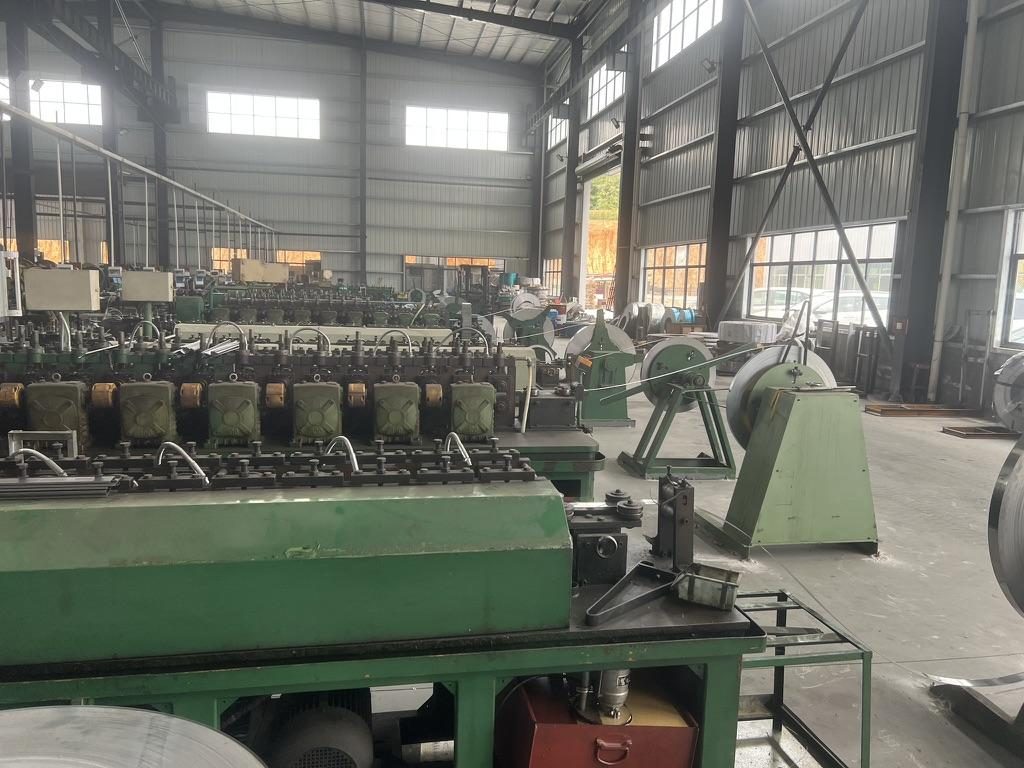 Roll-forming line producing rail members